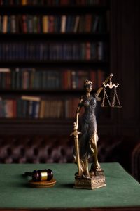 Lady Justice Holding the Scales of Justice representing the ethical and moral compass used during Consulting Services, Training Services, and Presenting Services in Baltimore, MD.